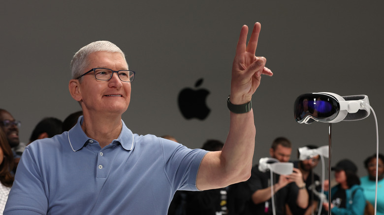 Tim Cook next to headset