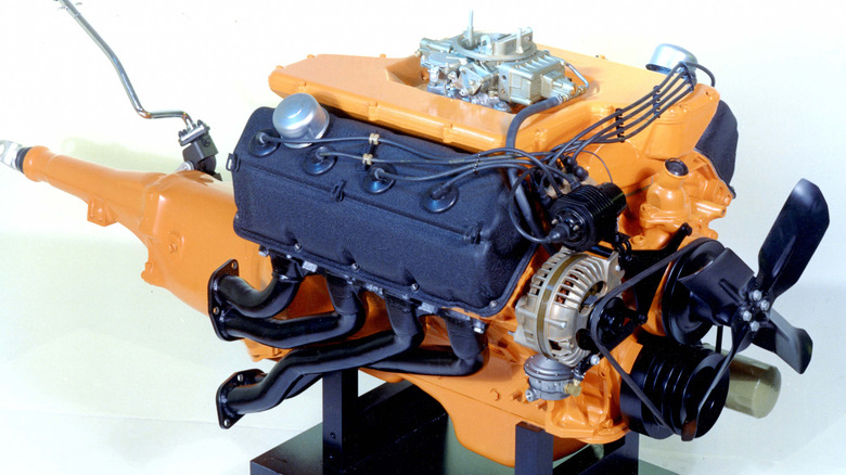 HEMI engine on stand with dark blue valve covers and manual transmission