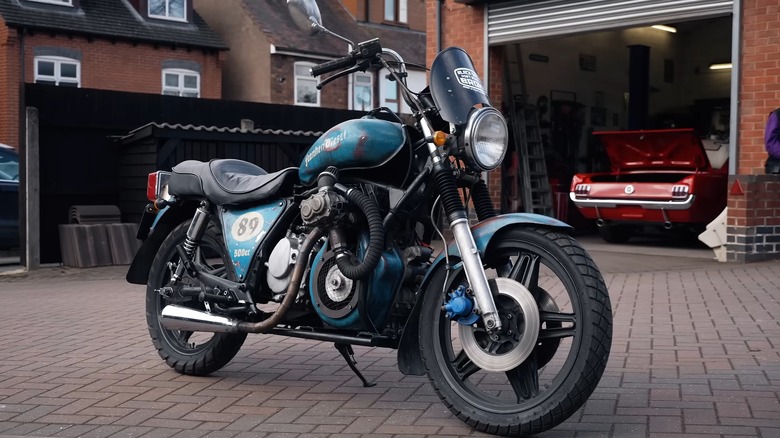 The Frankendiesel motorcycle parked in a residential area