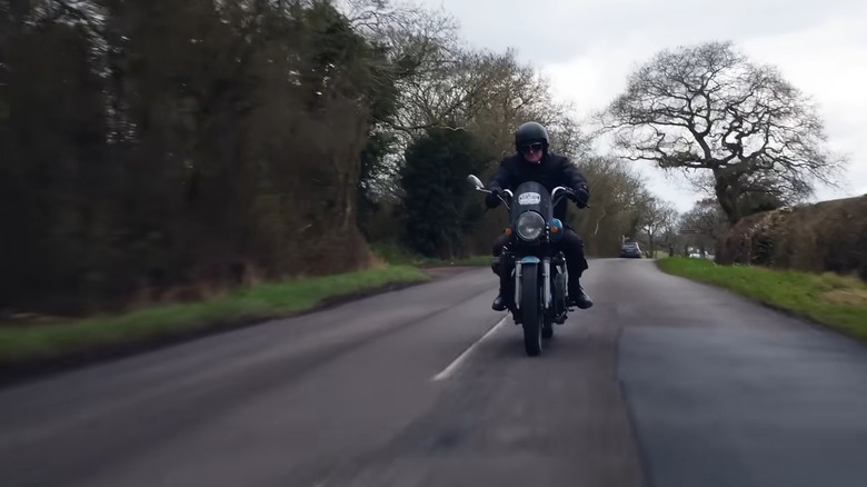 The owner of the Frankendiesel riding it along country roads in the UK