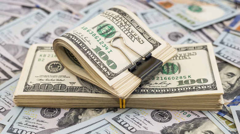 100 dollar bills stacked