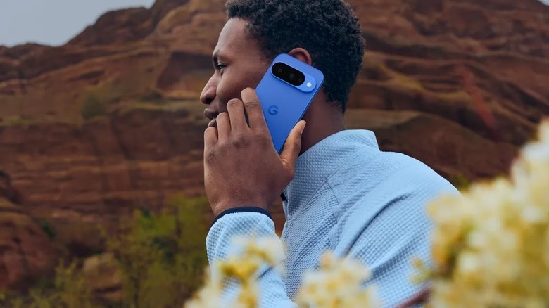 Person using a Pixel 10 smartphone