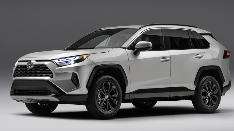 White Toyota RAV4 front left view in studio