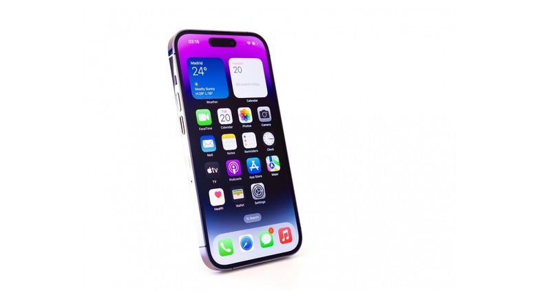An iPhone on a white background with the Home Screen on