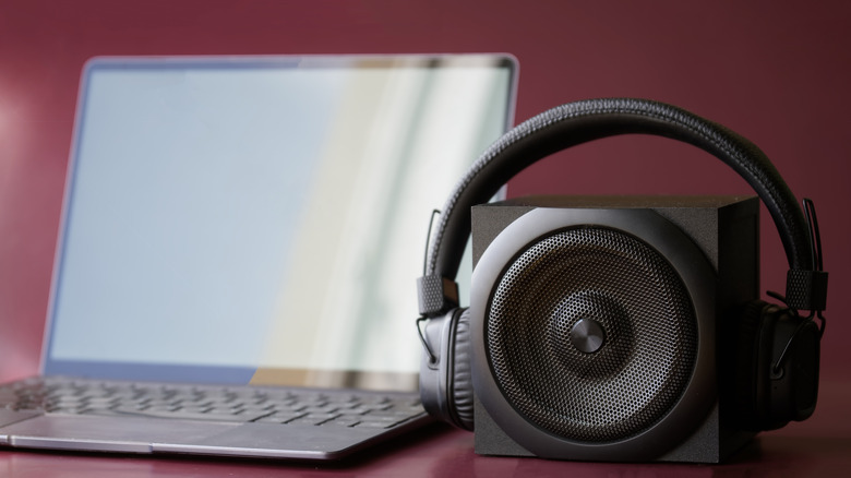 Laptop with speaker and headphones