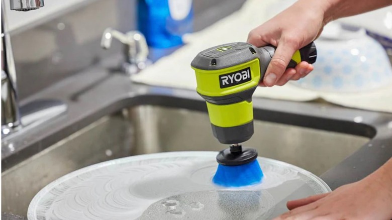 Ryobi USB Lithium Power Scrubber cleaning a kitchen sink