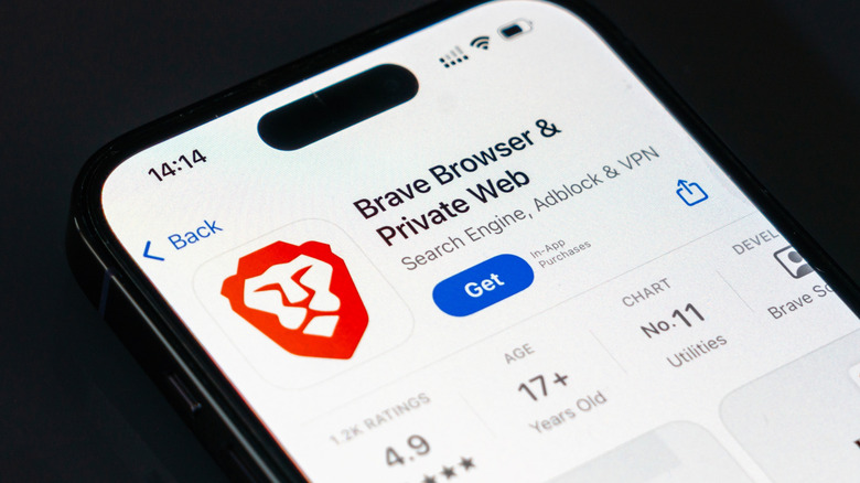 A phone displaying the Brave Browser download page.