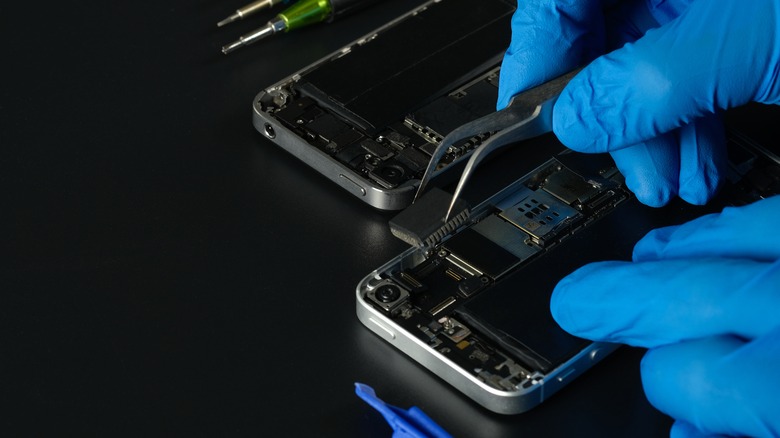 Smartphone being repaired