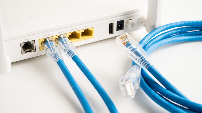 Router with ethernet cables connected to the rear ports