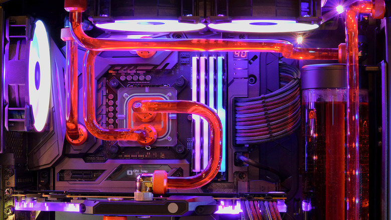 Interior of gaming PC while running, pink LED lights turned on