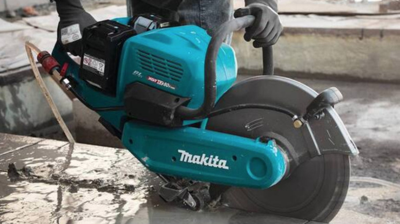 Makita Power Cutter being used on stone
