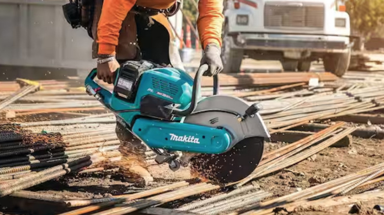 Makita Power Cutter being used on metal
