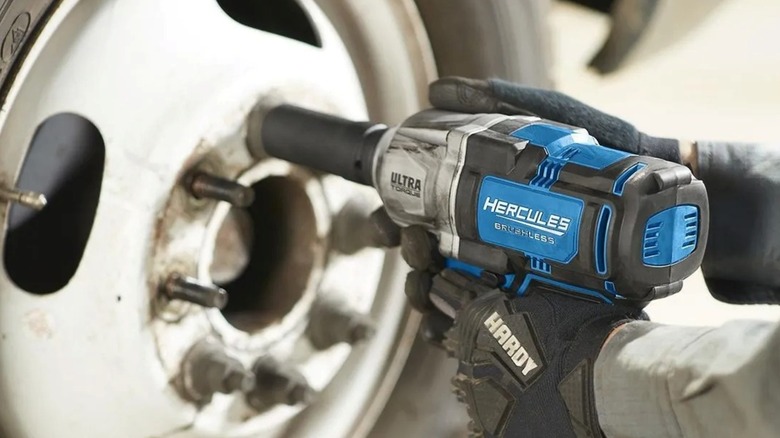 Using a 3/4-inch Hercules Ultra Torque impact wrench to remove heavy-duty lug nuts.