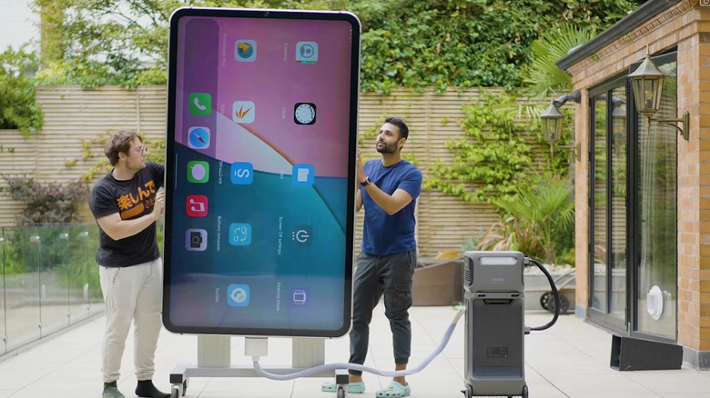 Arun Maini with his iPhone 15 Pro Max replica