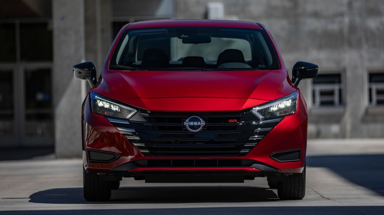 a red Nissan Versa in SR trim