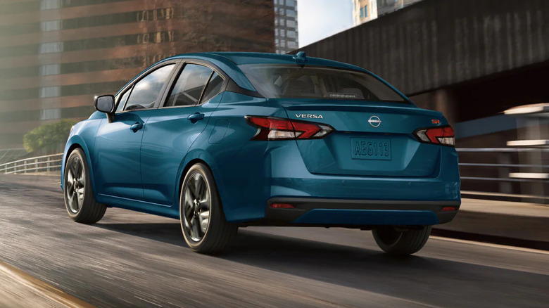 2025 Nissan Versa driving down city street