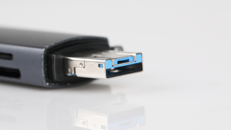 USB thumb drive with USB port zoomed in