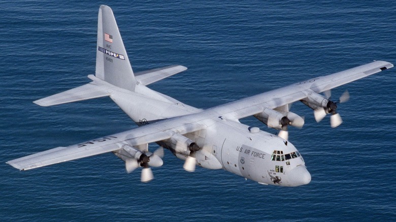 A C-130E Hercules flies over the Atlantic Ocean