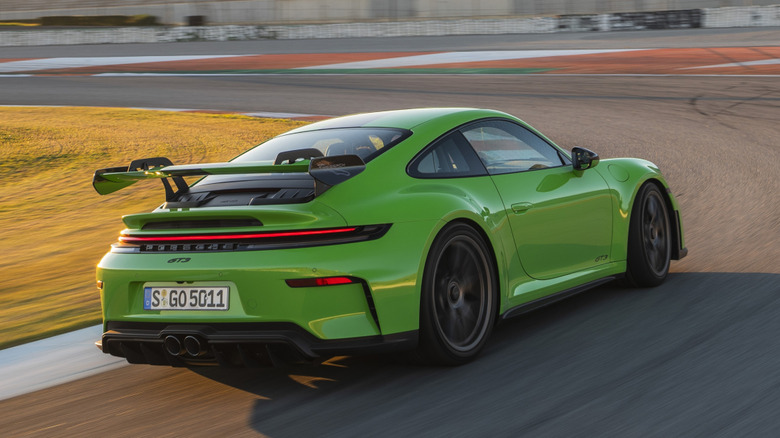 Rear 3/4 view of Porsche 911 GT3 with Weissach Package in track setting