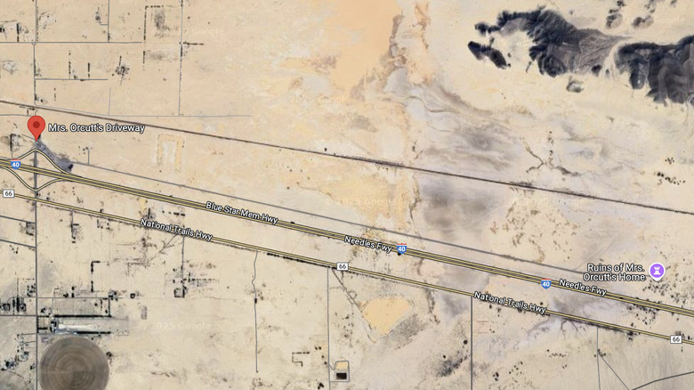 A screenshot from Google Maps showing Mrs. Orcutt's driveway and the ruins of her home.