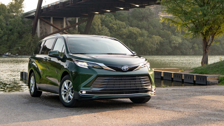 Front 3/4 view of 2022 Toyota Sienna by river