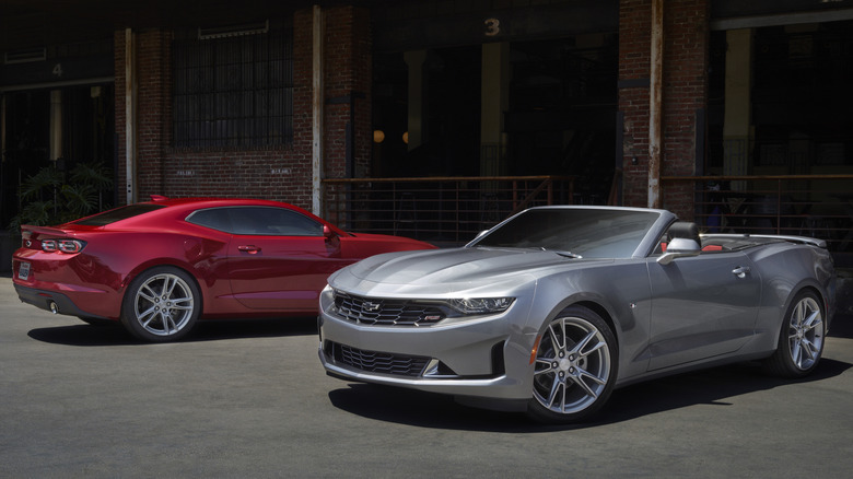 2023 Chevrolet Camaro Coupe and Camaro Convertible parked side by side