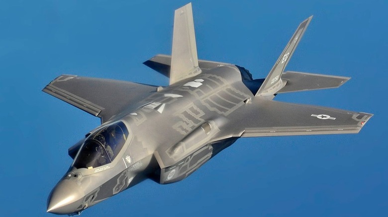 Front view of F-35A fighter jet in flight.