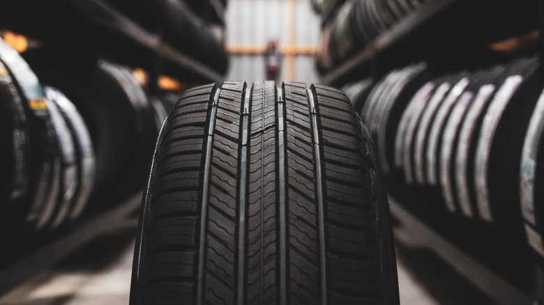 Close-up of a tire after being removed from storage rack