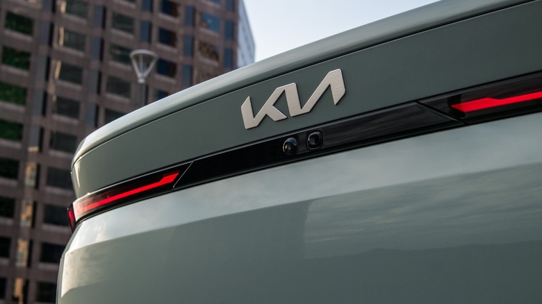 Close up of Kia logo on the rear of a Kia K4