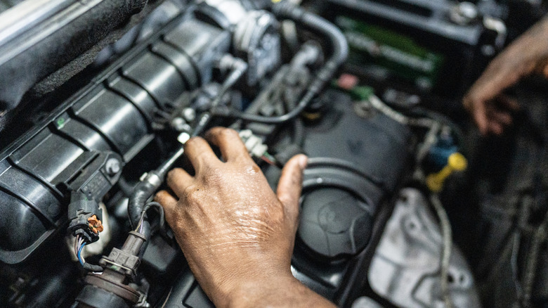 Mechanic working on an engine