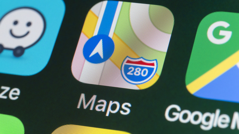 Icons for Waze, Apple Maps, and Google Maps on an iPhone home screen
