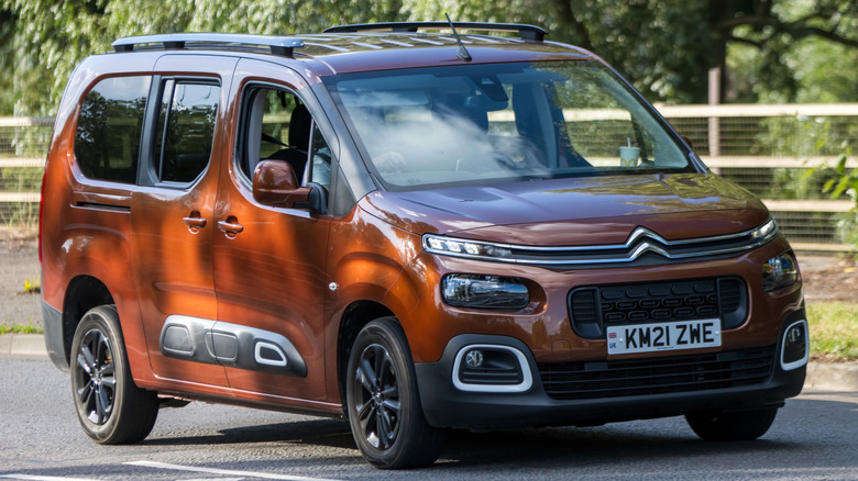 An orange 2021 Citroen Berlingo on a road in the UK