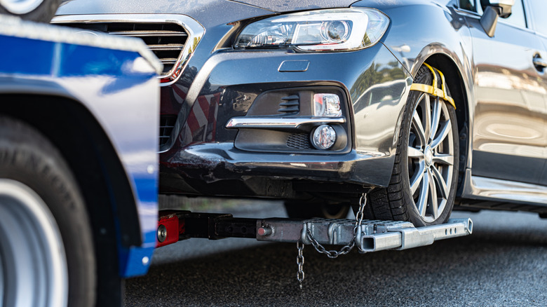 Tow truck towing a car