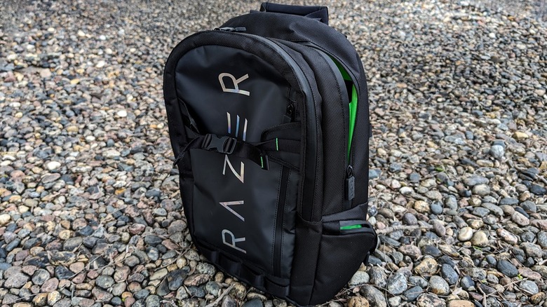Razer brand backpack sitting in rocks