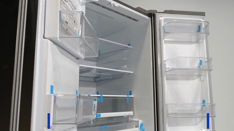 An LG fridge with the doors opened.