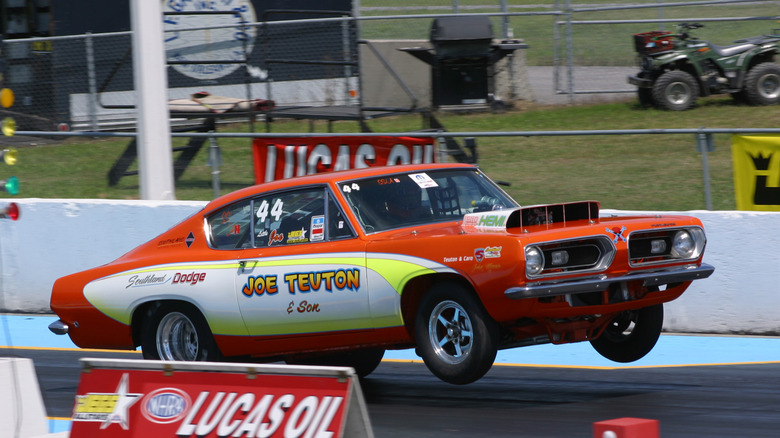A Hemi Barracuda lifts its front wheels off the ground from the starting line at the 2007 Cajun Nationals.