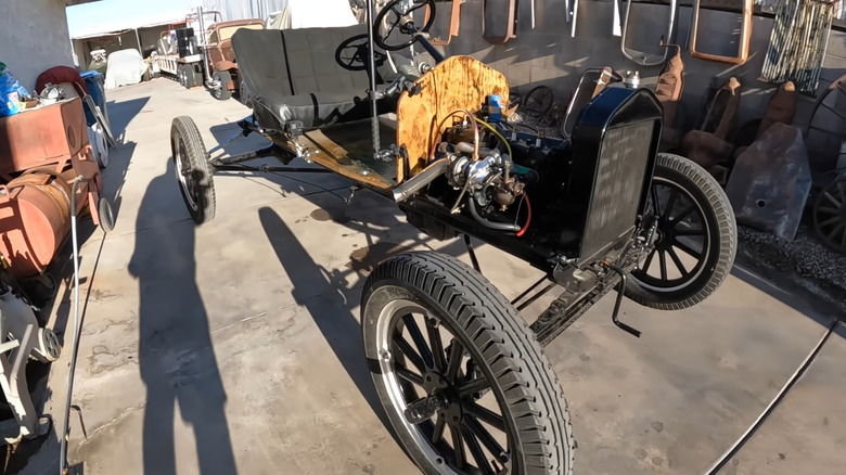 A stripped down Model T with a turbocharger added against various other miscellanious items