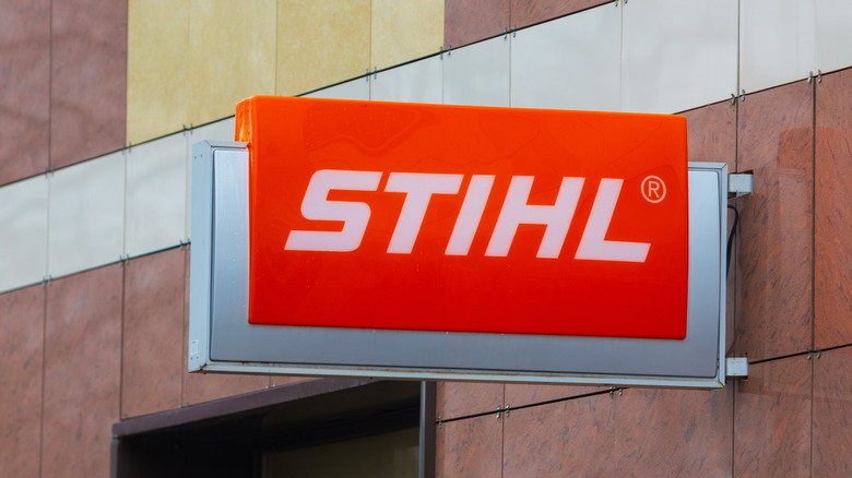 Stihl logo on a wall.
