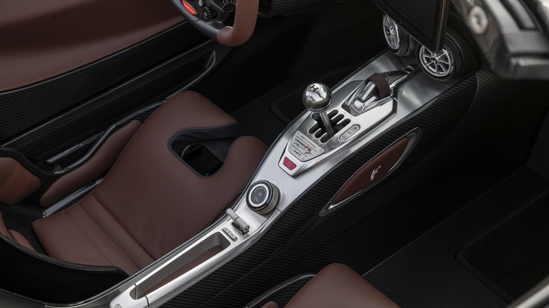 View of interior of Hennessey Venom F5 Revolution LF showing gated 6-speed manual transmission