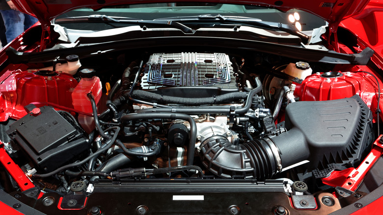 A supercharged 6.2 liter supercharged LT4 V8 under the hood of a Camaro ZL1