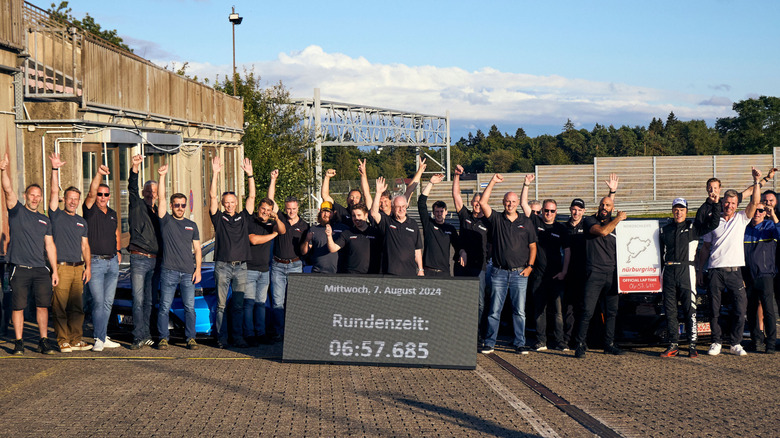 Group shot of Mustang GTD team celebrating Nürburgring time