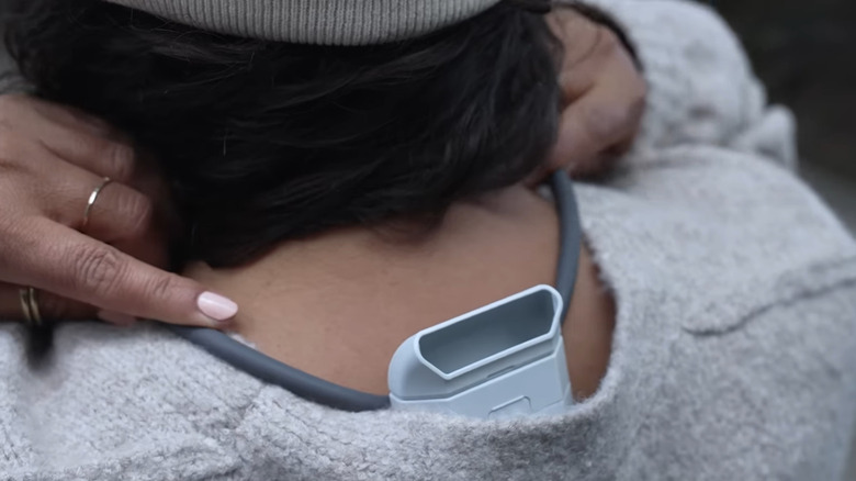 Reon Pocket Pro Plus worn on person's shoulders