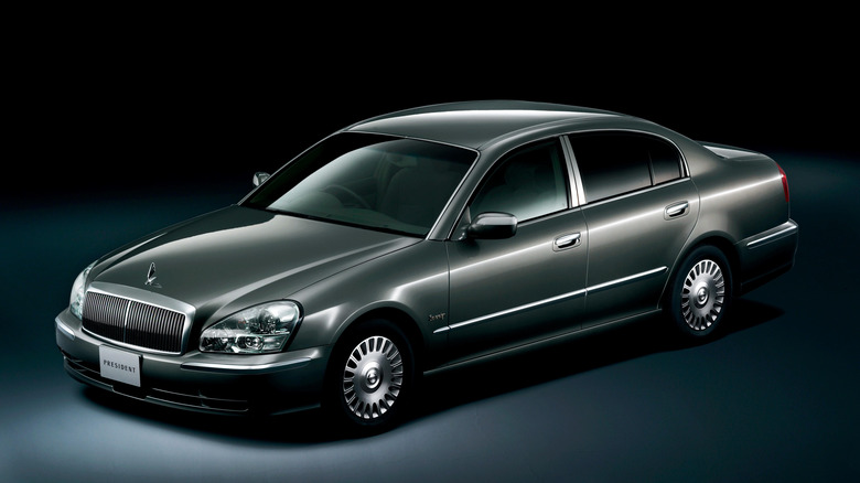 2003 Nissan President dark studio shot, front 3/4 view, gray exterior