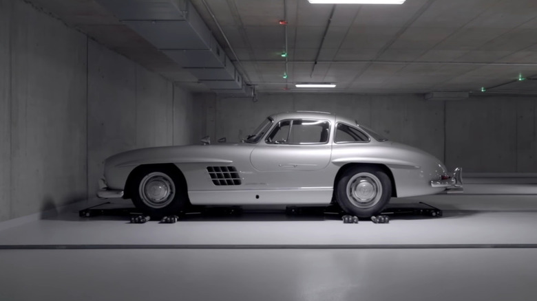 Robot transporter drops Mercedes in its spot at the storage facility