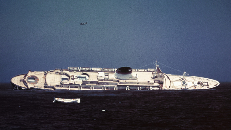 Italian ocean liner Andrea Doria sinking after a collision with the Swedish ocean liner Stockholm off Cape Cod