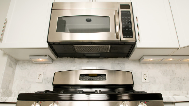 Picture showing microwave installed over a range