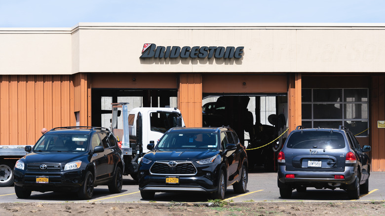 Cars outside a Bridgestone tire shop