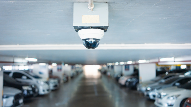 Cars parked under CCTV camera surveillance