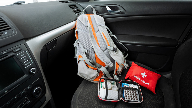 Winter driving essentials on the passenger seat