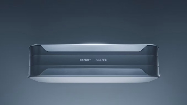 Donut compact solid-state EV battery shown head-on with logo